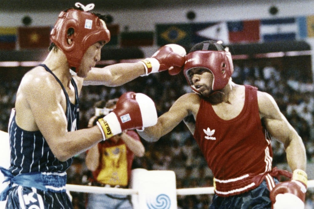 South Korea’s Park Si-hun (left) delivers a left jab to Roy Jones Jnr of the US during their fight at the 1988 Olympics in Seoul, South Korea. Photo: AP