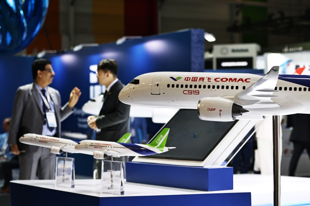 People visit the booth of Commercial Aircraft Corporation of China (COMAC) during the 55th Paris Air Show at Le Bourget Airport near Paris, on June 17. Photo: Xinhua