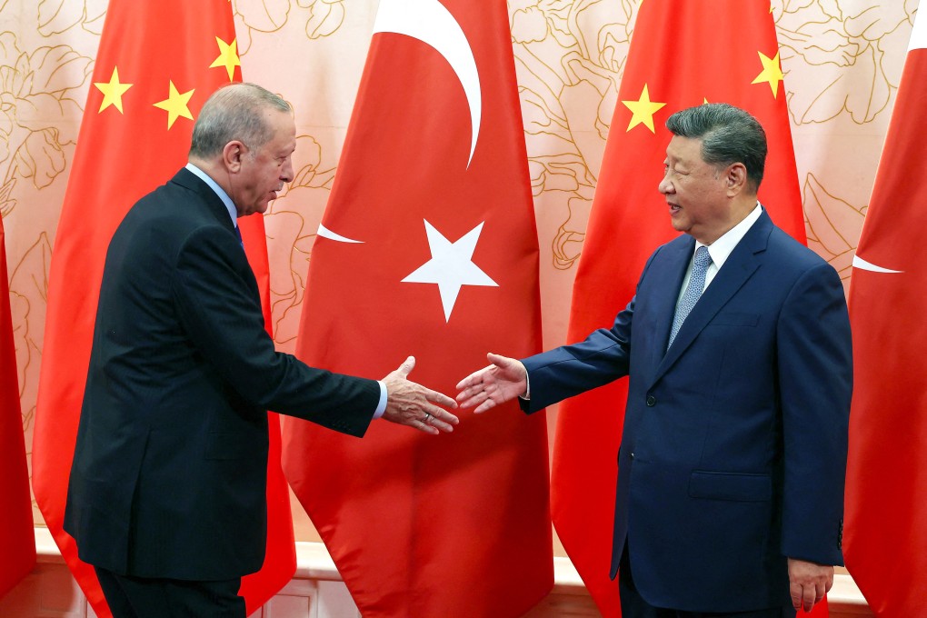 Turkish President Recep Tayyip Erdogan (left) shakes hands with Chinese President Xi Jinping during the Shanghai Cooperation Organisation summit in Tianjin this week. Erdogan was one of several leaders Xi met during bilateral talks over the week. Photo:  Handout/Turkish Presidential Service/ AFP