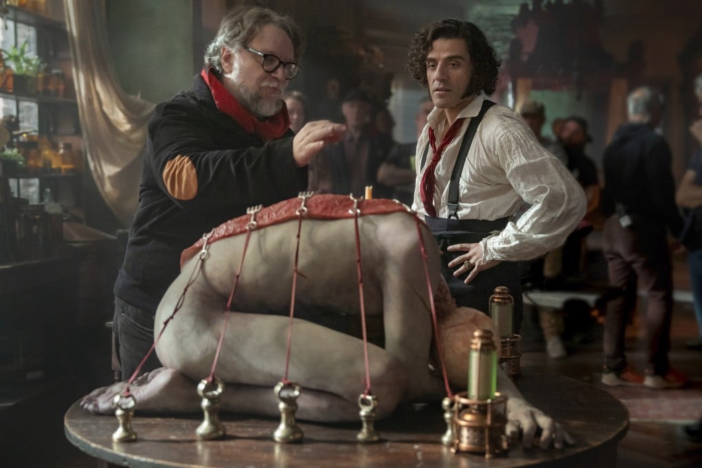 Director Guillermo del Toro (left) and Oscar Isaac on the set of Frankenstein (2025). Photo: AP