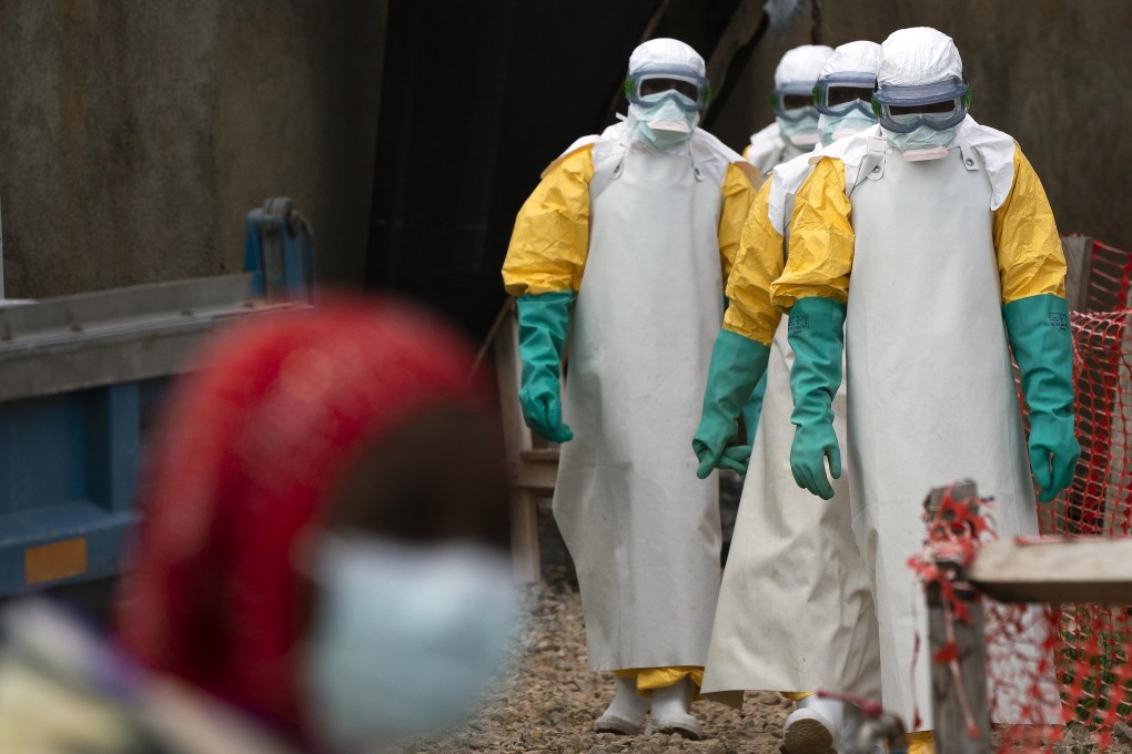 A health worker puts on Ebola protection gear in 2019. DR Congo has recorded 15 outbreaks since the disease was first identified in 1976. File photo: AP