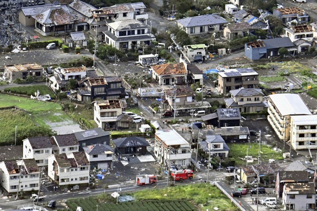 Roofs and exterior walls of residential houses, torn off following an apparent tornado, lie scattered as a typhoon hits wide areas of Japan, in Makinohara, Shizuoka prefecture, on Friday. Photo: Kyodo via Reuters