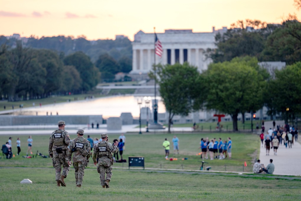 Members of the National Guard at the Washington Monument on Tuesday in Washington. Photo: TNS