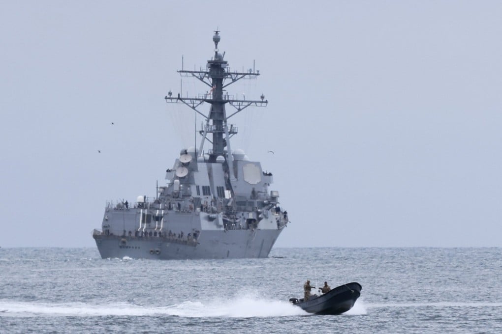 The USS Sampson departing Panama on Tuesday. The US has sent several ships carrying some 4,000 sailors and Marines to the Caribbean. Photo: EPA
