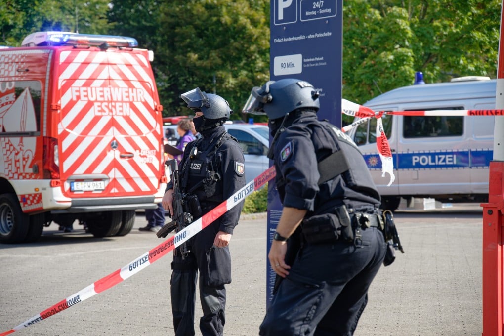 Police officers at a vocational college in Essen where a teacher was attacked and injured by a perpetrator with a knife. Photo: dpa