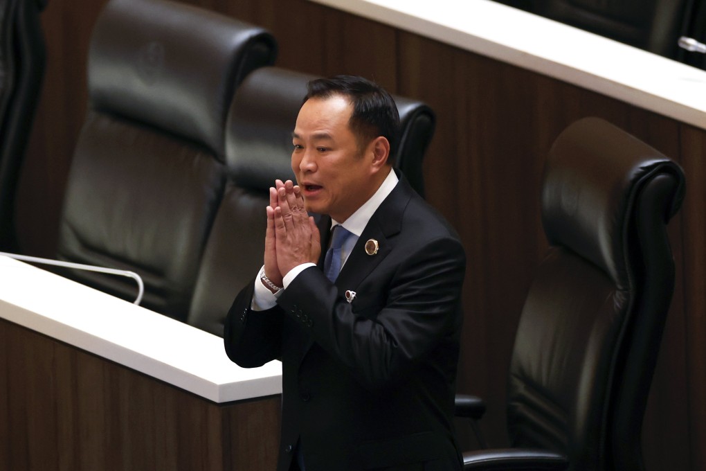 Anutin Charnvirakul greets lawmakers at parliament in Bangkok on Friday. Photo: EPA
