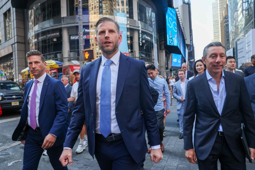 Eric Trump, a board  director of World Liberty Financial, walks outside Nasdaq in Times Square, New York City, on August 13, 2025. Photo: Getty Images via AFP