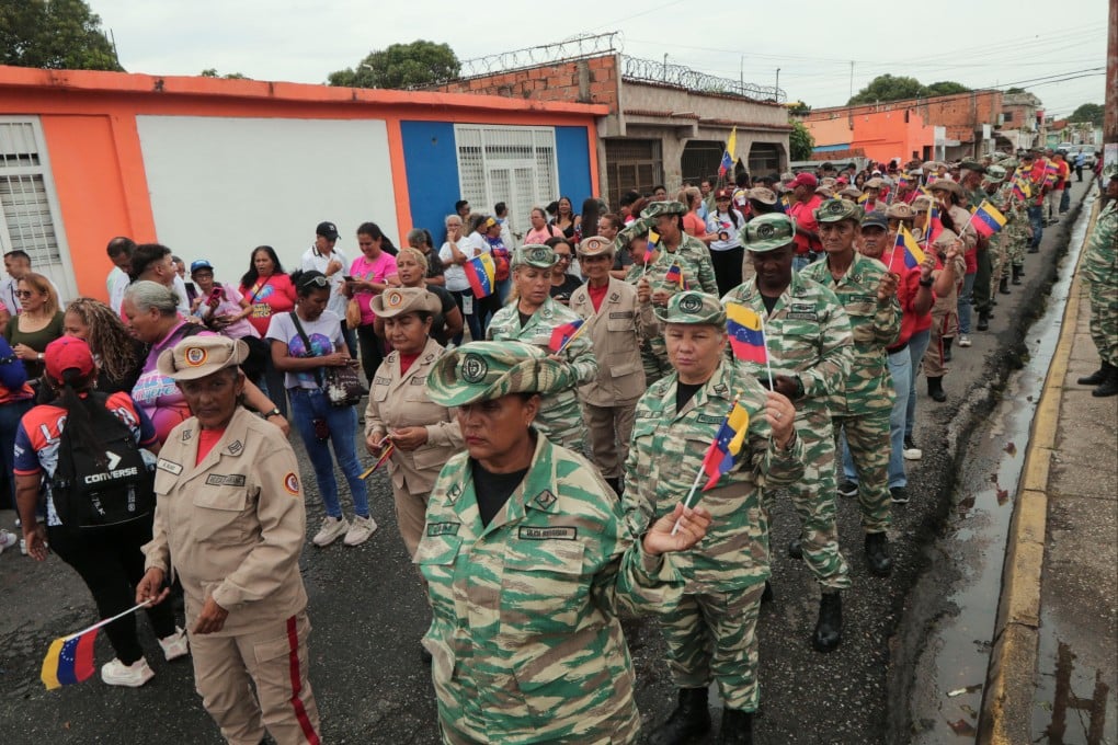 Members of the National Bolivarian Militia gather in Valencia, Venezuela on Friday after responding to President Nicolas Maduro’s call to defend national sovereignty amid rising tensions with the US. Photo: Reuters