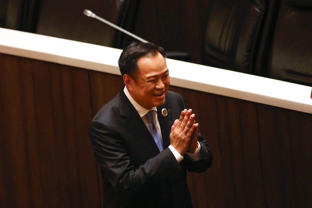 Anutin Charnvirakul performs a traditional greeting to thank lawmakers after being elected as prime minister during a voting session at parliament in Bangkok, Thailand, on Saturday. Photo: EPA