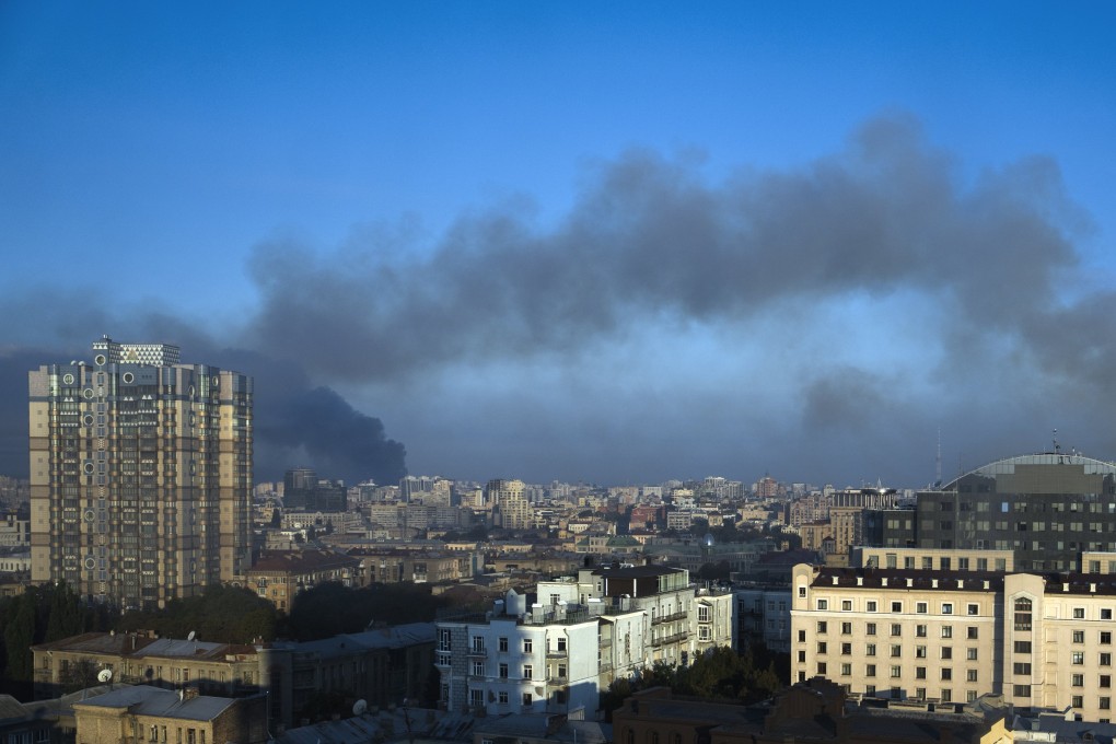 Smoke billows over Kyiv after Russian strikes hit on Sunday. Photo: EPA