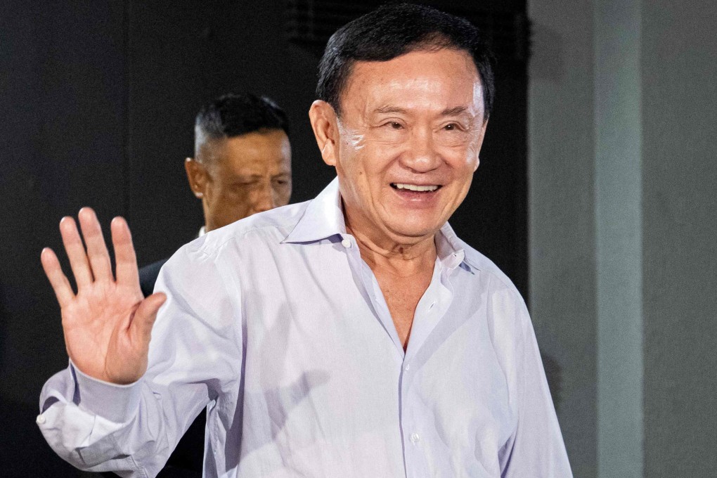 Thailand’s former Prime Minister Thaksin Shinawatra leaves the Pheu Thai Party headquarters in Bangkok on August 29. Photo: AFP