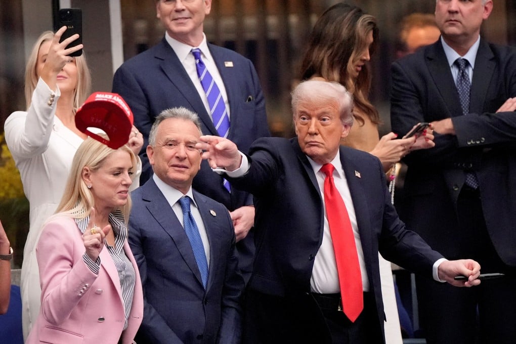 US President Donald Trump throws a hat after Spain’s Carlos Alcaraz won the men’s singles final. Photo: Reuters