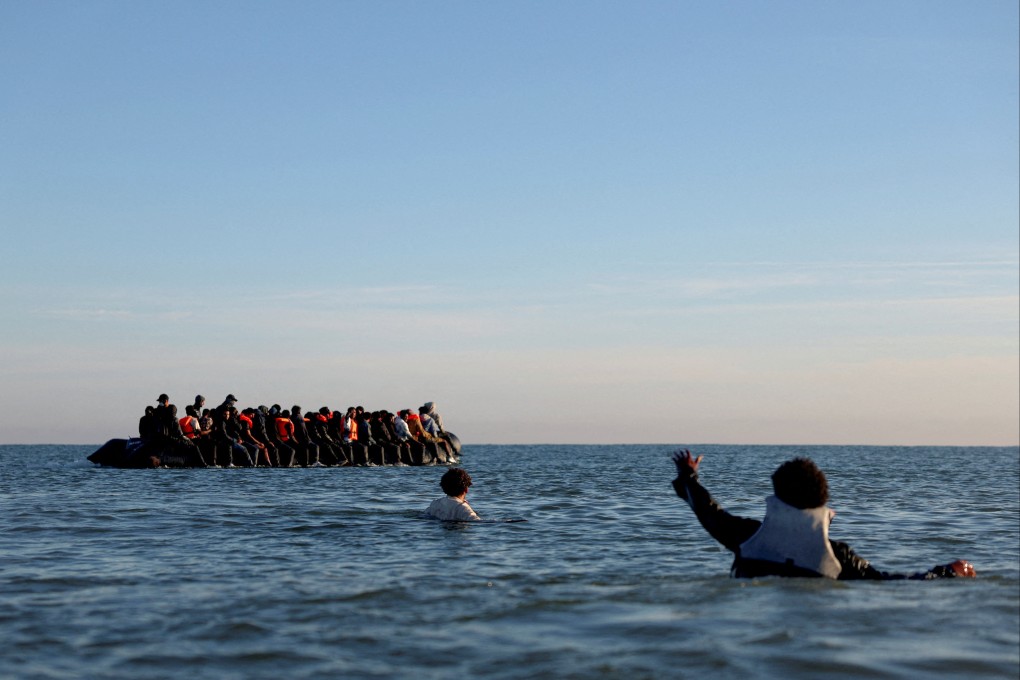 A group of migrants on an inflatable dinghy leave the coast of northern France in an attempt to cross the English Channel to reach Britain. File photo: Reuters