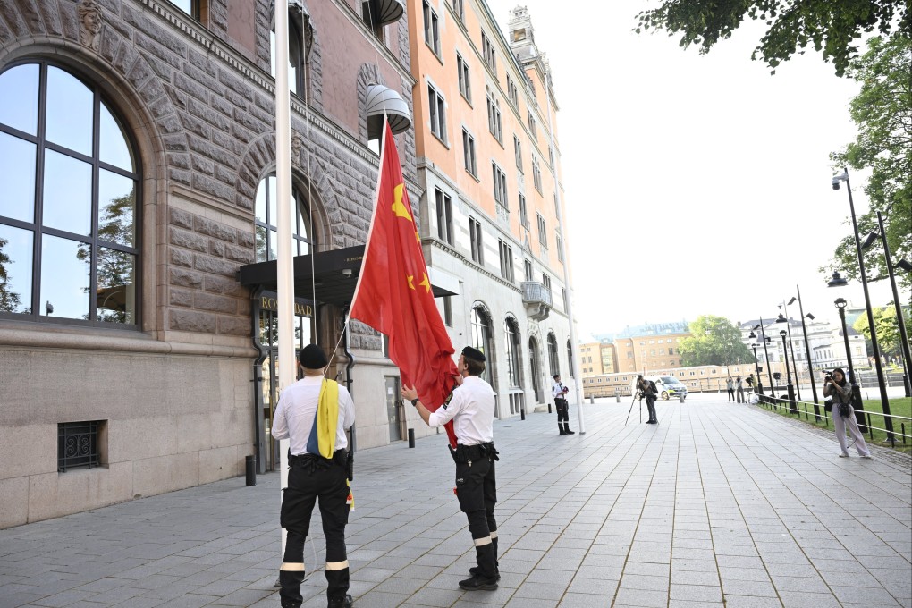 A Chinese flag is raised outside of Sweden’s government offices ‘Rosenbad’ ahead of the trade talks between China and the US in Stockholm in July. File photo: EPA