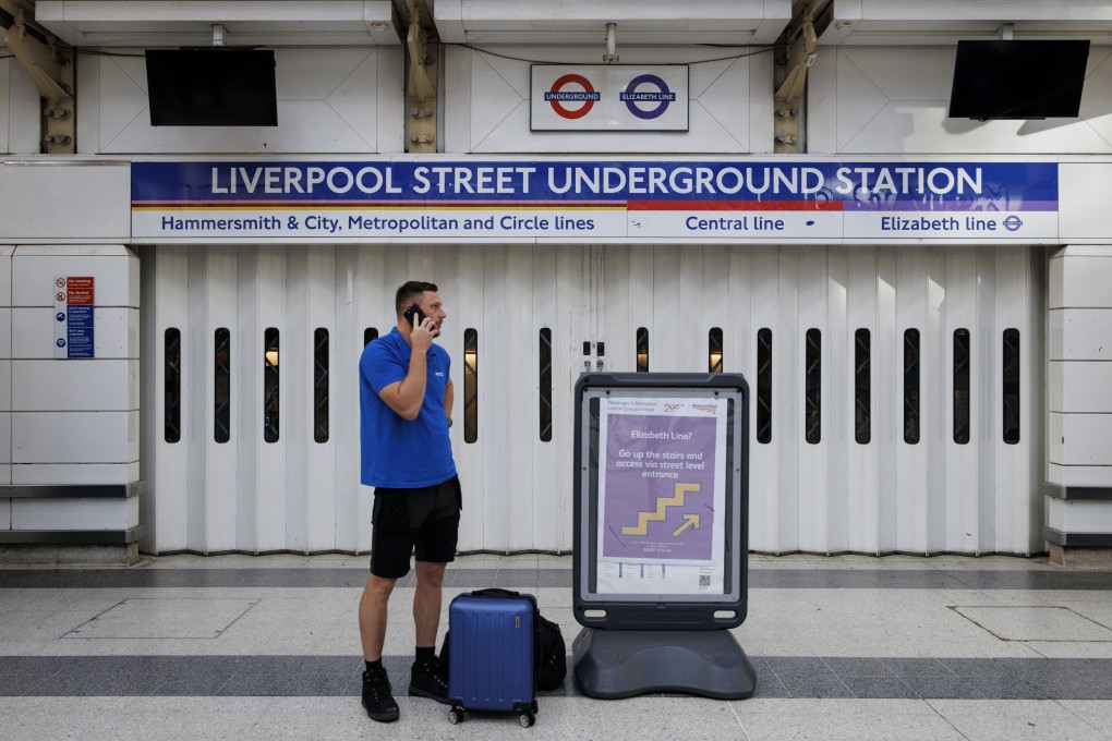 A commuter outside the closed Liverpool Street tube station due to a Tube strike that has shut down nearly all London Underground services in London, Britain, on Monday. Photo: EPA