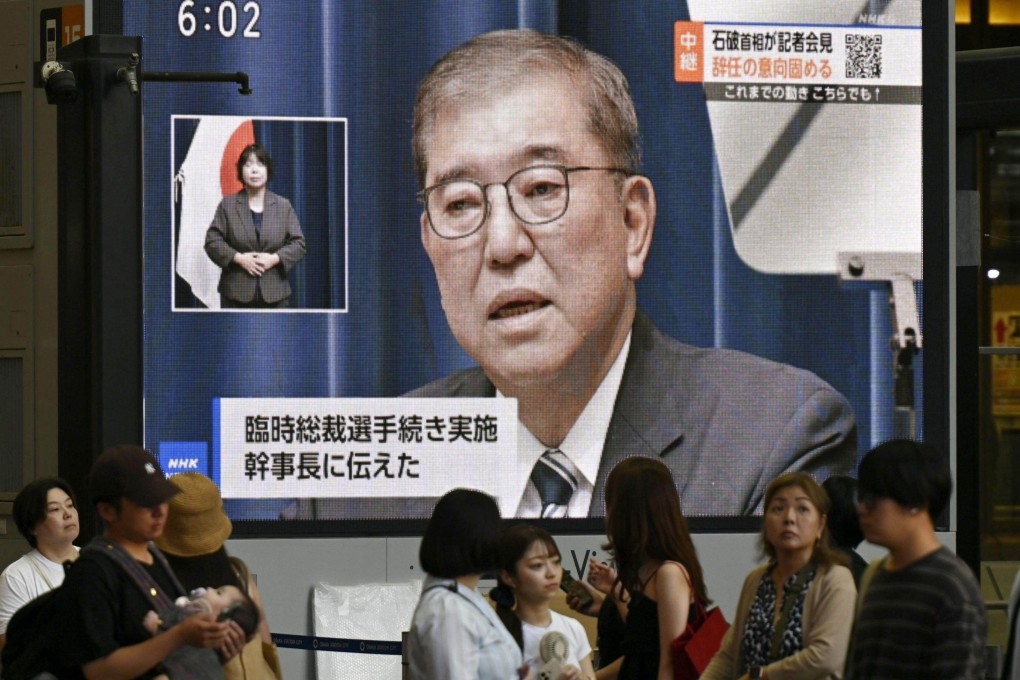 A street monitor in Osaka shows Japanese Prime Minister Shigeru Ishiba announcing his resignation on Sunday. Photo: Kyodo