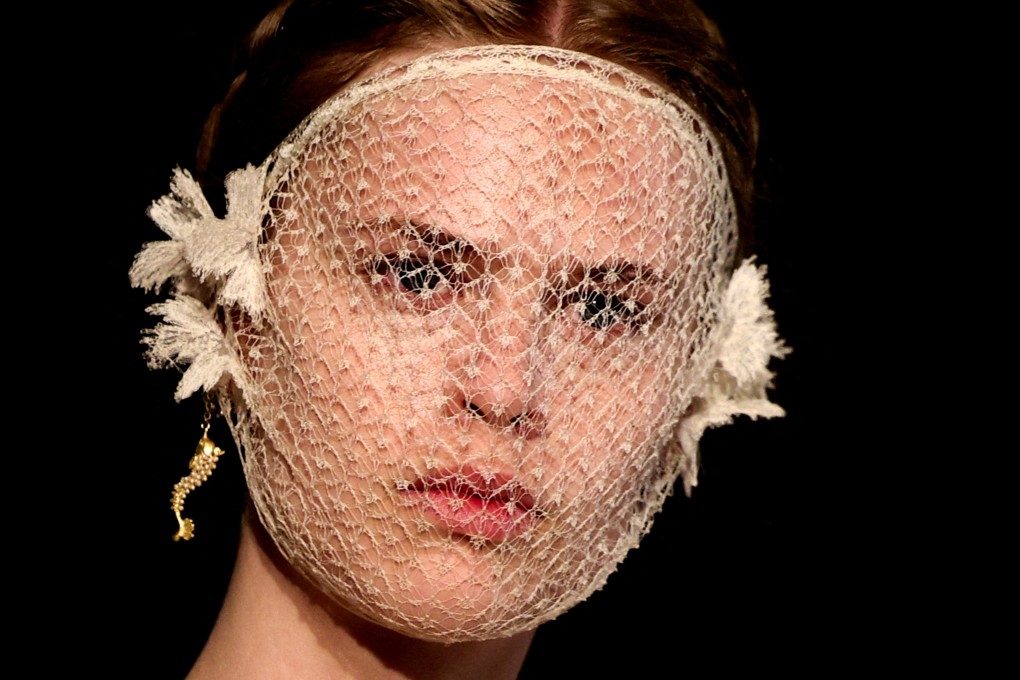 A model presents a creation by designer Maria Grazia Chiuri during the Christian Dior Cruise 2026 collection show at Villa Albani Torlonia in Rome, Italy, on May 27, 2025. Photo: Reuters