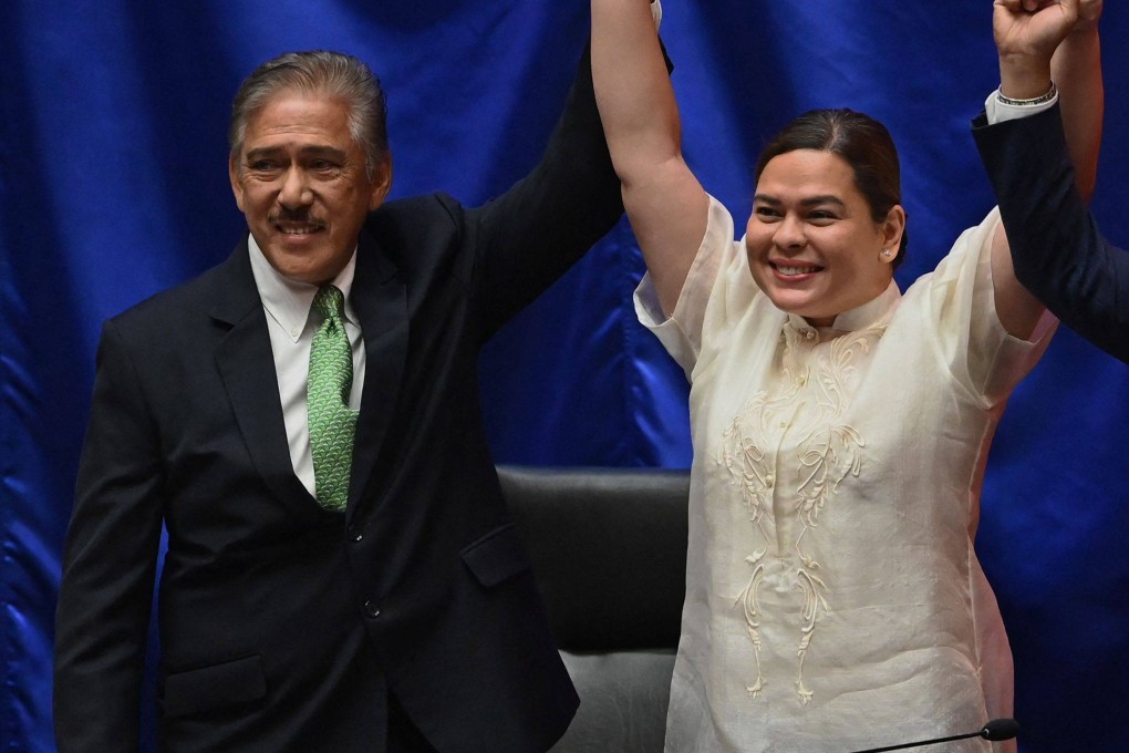 Sara Duterte-Carpio (right) proclaimed winner of the vice presidential race by Senate President Vicente Sotto III at the House of Representatives in Quezon City in 2022. Photo: AFP