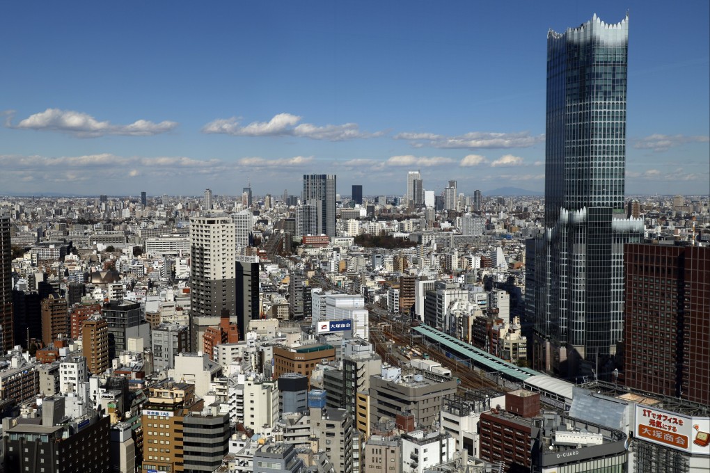 Office and residential buildings are seen from an observatory deck in the Shinjuku business district of Tokyo, Japan, on February 10. Photo: EPA-EFE