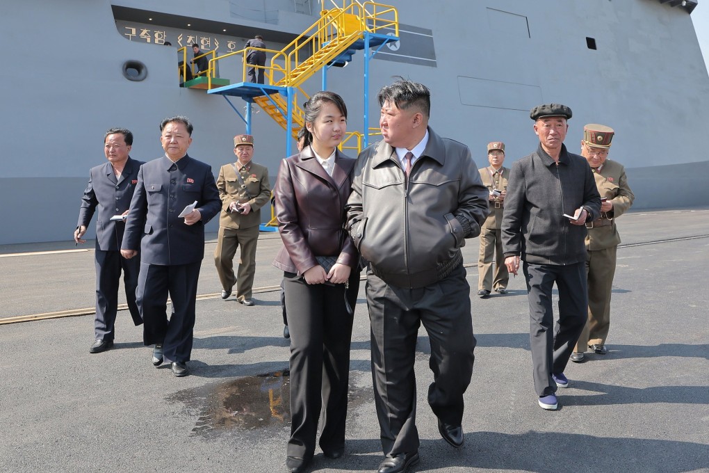 North Korean leader Kim Jong-un and daughter Kim Ju-ae attending the first test firing on the destroyer Choe Hyon at an undisclosed location in North Korea in April. Photo: EPA-EFE