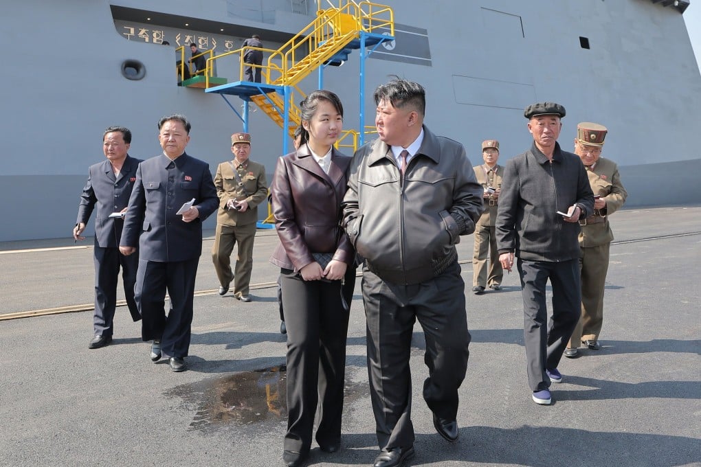 North Korean leader Kim Jong-un and daughter Kim Ju-ae attending the first test firing on the destroyer Choe Hyon at an undisclosed location in North Korea in April. Photo: EPA-EFE