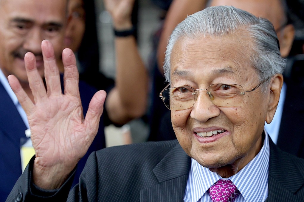 Former Malaysian prime minister Mahathir Mohamad leaves the Kuala Lumpur High Court in Kuala Lumpur, Malaysia. He has repeatedly denied claims that he had abused his power to amass his alleged riches. Photo: EPA