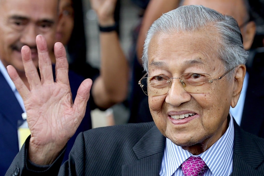 Former Malaysian prime minister Mahathir Mohamad leaves the Kuala Lumpur High Court in Kuala Lumpur, Malaysia. He has repeatedly denied claims that he had abused his power to amass his alleged riches. Photo: EPA