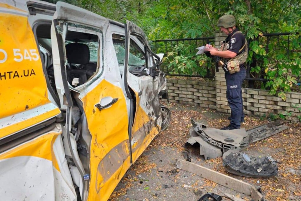 A Ukrainian policeman works at a site of a Russian aerial strike in Yarova, Donetsk region on Tuesday. Photo: Ministry of Internal Affairs of Ukraine/AFP