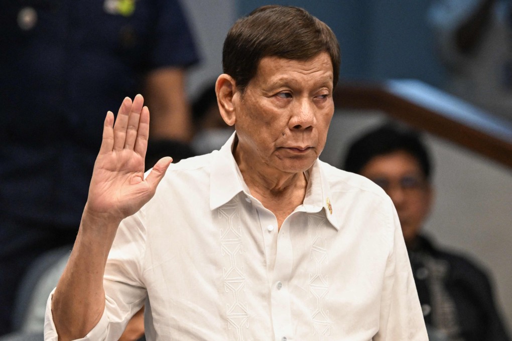 Ex-president Rodrigo Duterte takes an oath during a Philippine Senate investigation into his war on drugs in October last year. Photo: AFP