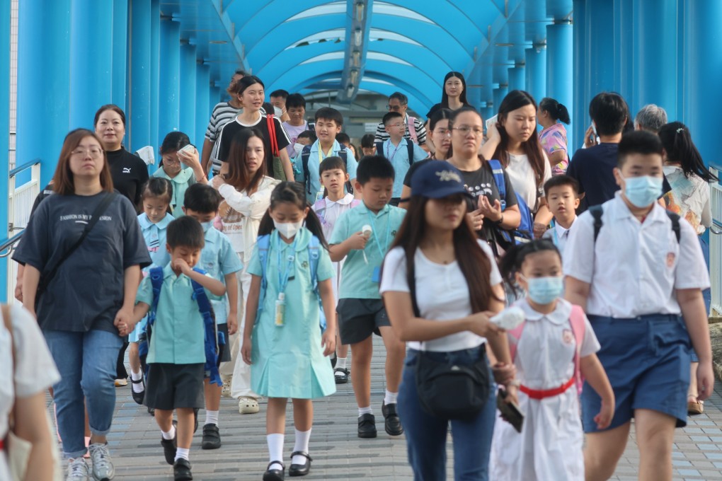 Primary-age children head back on the first day of school in Tsz Wan Shan on September 1. Photo: Edmond So