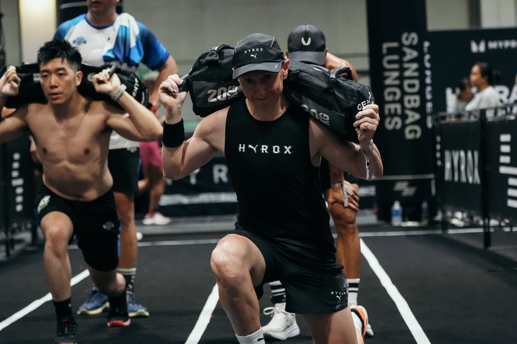 Douglas Bray (centre) competes in the Hyrox challenge in Hong Kong in July 2025. Completing the gruelling race left the cancer survivor feeling “fully recovered” three years after his life-changing surgery. Photo: Douglas Bray