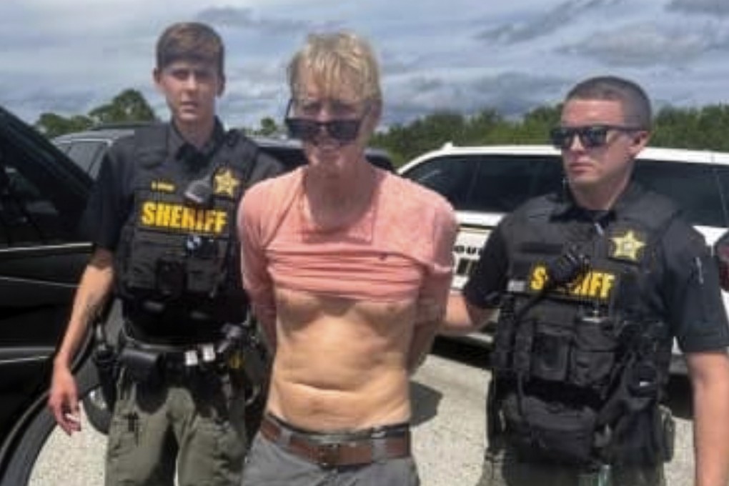 Police officers arrest Ryan Routh after an apparent assassination attempt on Donald Trump, on September 15. Routh has pleaded not guilty to charges of attempting to assassinate a major presidential candidate, assaulting a federal officer and several firearm violations. Photo: Martin County Sheriff’s Office via AP