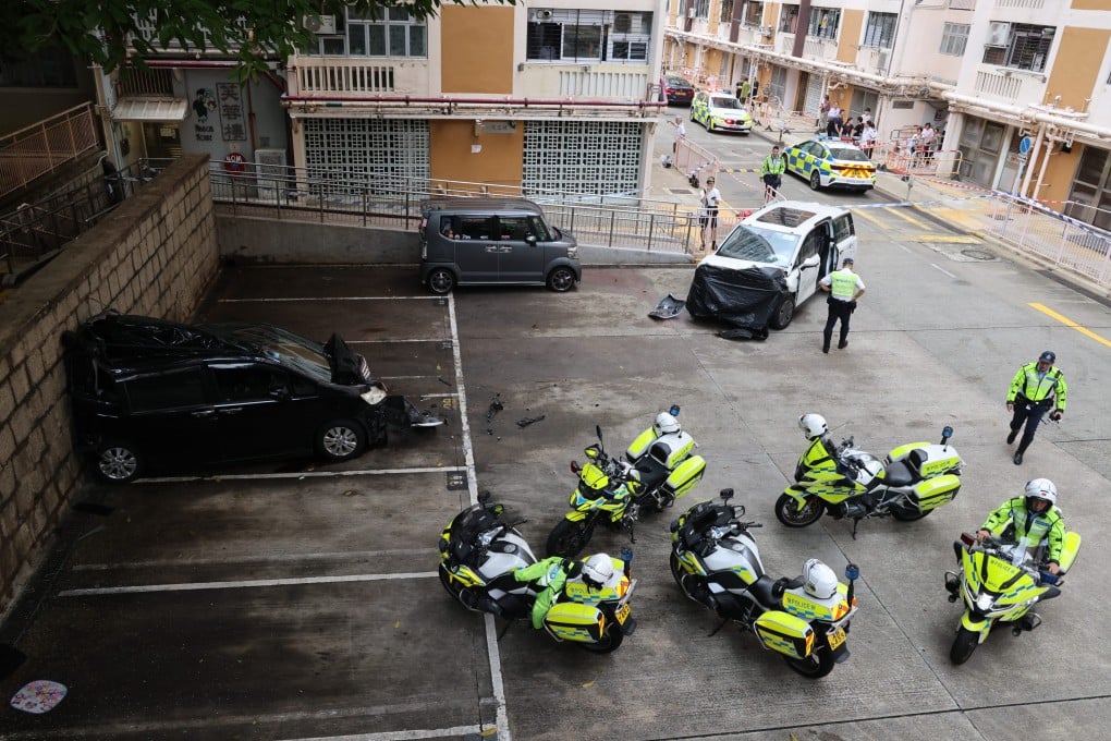 A woman has died after being hit by a CLP Power vehicle, right, which subsequently collided with another car, left, outside of the Ma Tau Wai Estate in To Kwa Wan. Photo: Jelly Tse