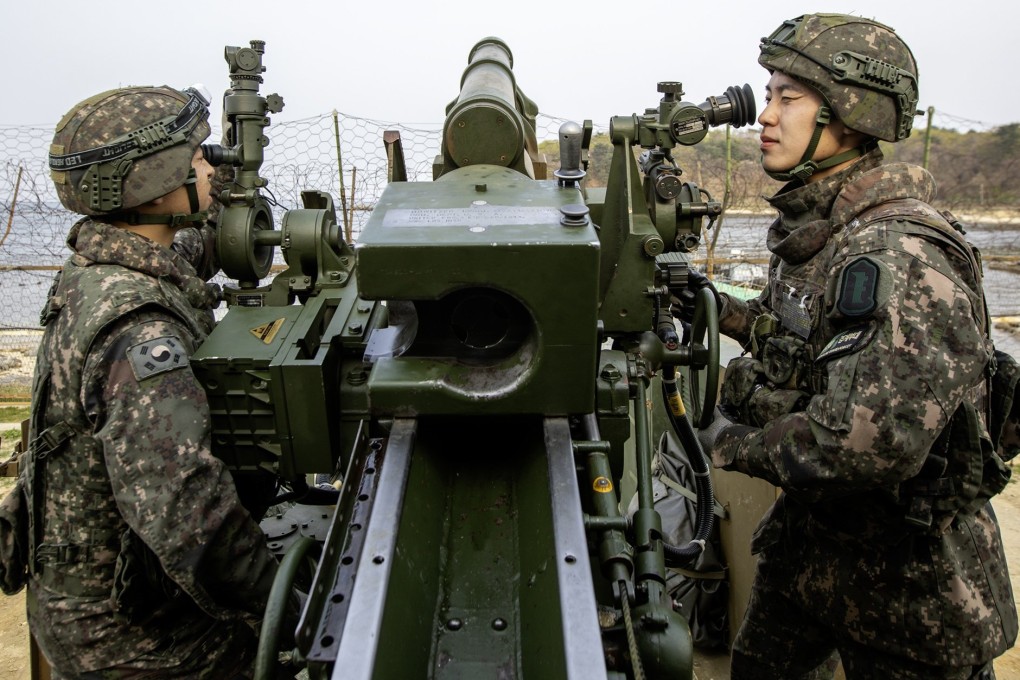 South Korean soldiers prepare to fire a howitzer towards the sea off Goseong, Gangwon Province. Photo: Republic of Korea Army/EPA-EFE