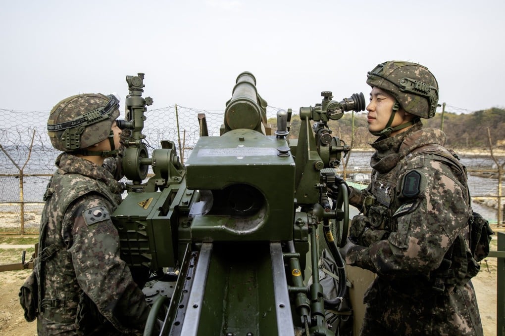 South Korean soldiers prepare to fire a howitzer towards the sea off Goseong, Gangwon Province. Photo: Republic of Korea Army/EPA-EFE