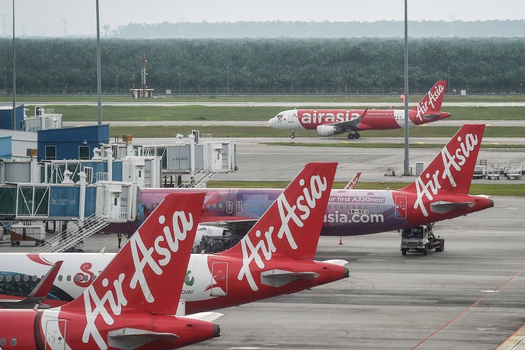AirAsia planes are pictured on the tarmac at Kuala Lumpur International Airport in Sepang. Photo: AFP