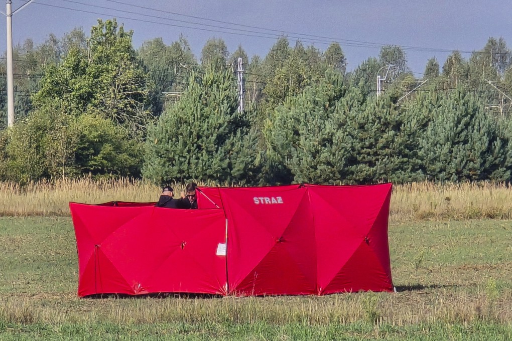 Responders secure parts of a UAV shot down near Biala Podlaska, Poland. Photo: AP
