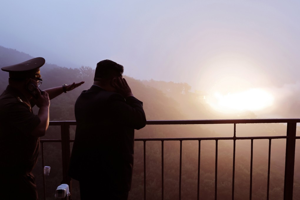North Korean leader Kim Jong-un oversees a ground jet test of a high-thrust solid-fuel engine using composite carbon fibre material at an undisclosed location in North Korea on Tuesday. Photo: KCNA/EPA