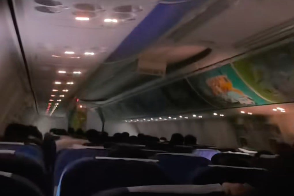 A screenshot of a video taken inside the cabin of a China Southern Airlines flight from Zhuhai to Taiyuan. The Boeing 737 was forced into an emergency landing on Monday evening due to intense thunderstorms. Photo: Douyin