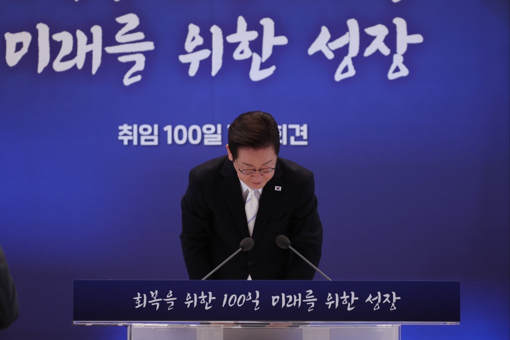South Korean President Lee Jae-myung bows during a press conference marking his 100 days in office in Seoul on Thursday. Photo: EPA