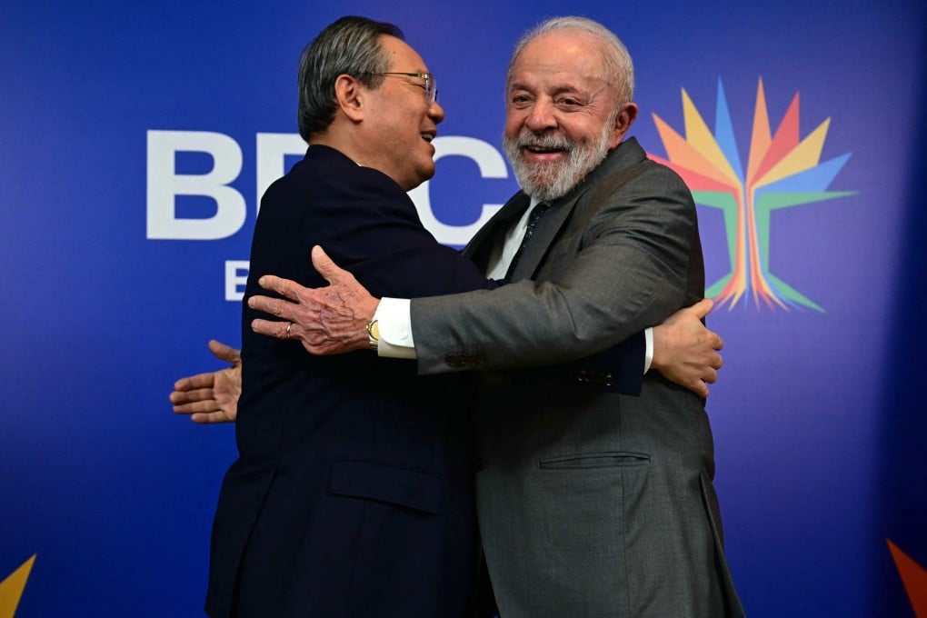 Brazil’s President Luiz Inacio Lula da Silva hugs China’s Premier Li Qiang after a bilateral meeting ahead of the BRICS summit in Rio de Janeiro on July 5. Photo: AFP