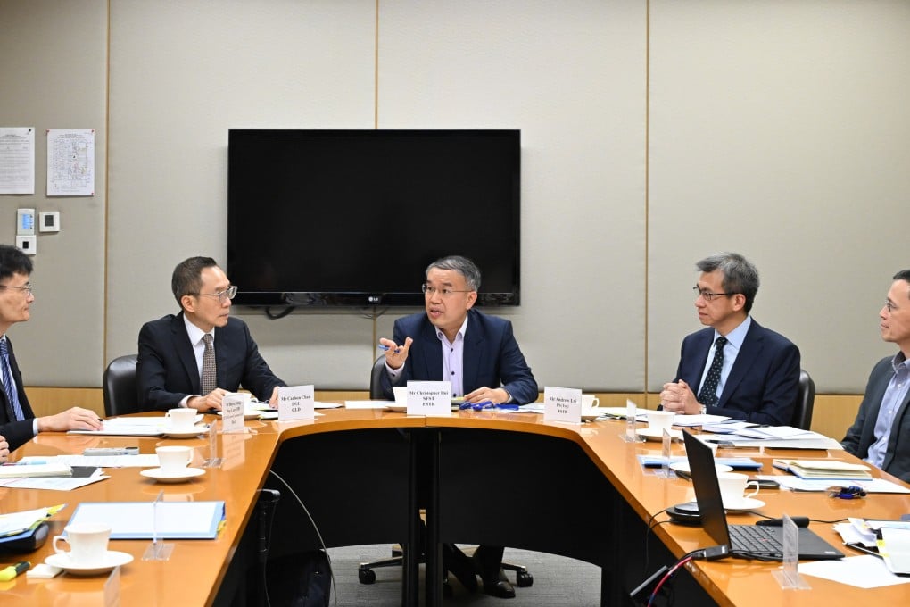 Secretary for Financial Services and the Treasury Christopher Hui Ching-yu (centre) chairs the first meeting of the Task Force on Review of Government Procurement Regime on August 21. Photo: ISD