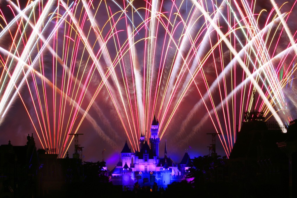 Fireworks light up the night sky over the Sleeping Beauty Castle in Hong Kong Disneyland after the theme park opened on September 12, 2005. File photo: AP