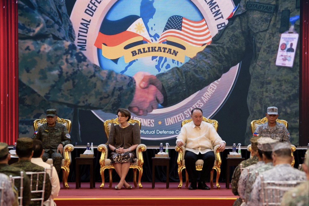(From left) Philippine military chief General Romeo Brawner, US ambassador to the Philippines Marykay Carlson, Philippine defence minister Gilberto Teodoro and US Marines Lieutenant General Michael Cederholm watch a video presentation during the closing ceremony of the annual Philippines-US joint military exercise “Balikatan” in May. Photo: AFP