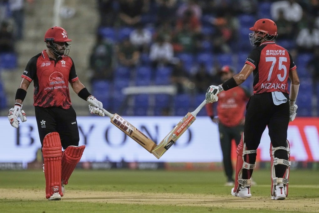 Hong Kong batsmen Nizakat Khan (right) and Zeeshan Ali put on a third-wicket stand of 41 against Bangladesh at Zayed Cricket Stadium in Abu Dhabi on Thursday. Photo: AP