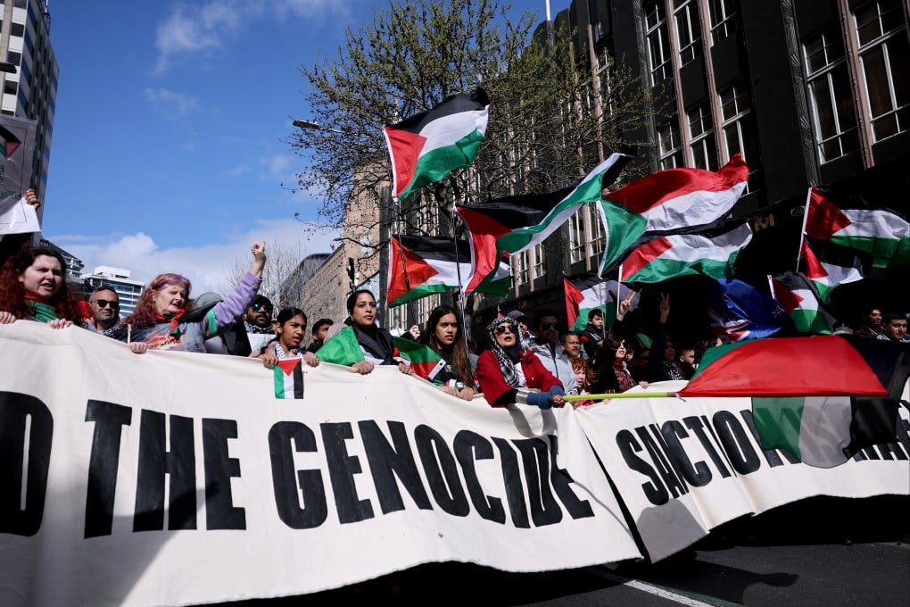 Thousands of protesters march through Auckland, New Zealand, on Saturday. Photo: Getty Images