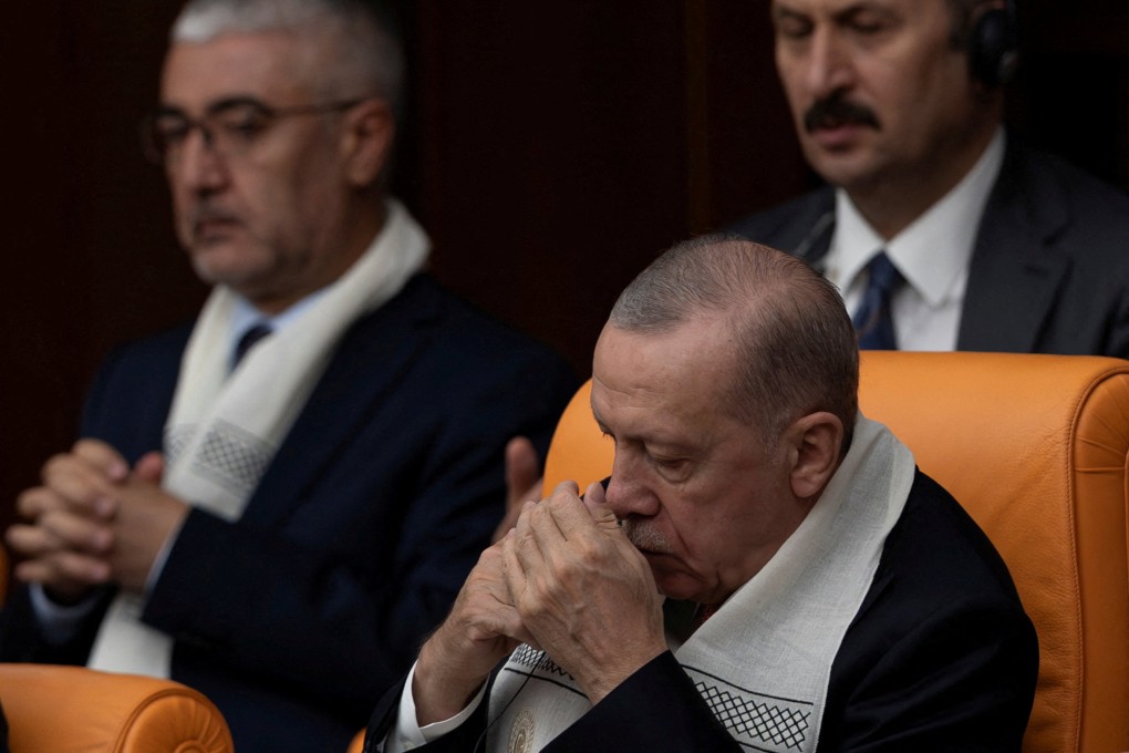 Turkish President Recep Tayyip Erdogan prays for the late Hamas leader Ismail Haniyeh in Ankara last year. Photo: Reuters