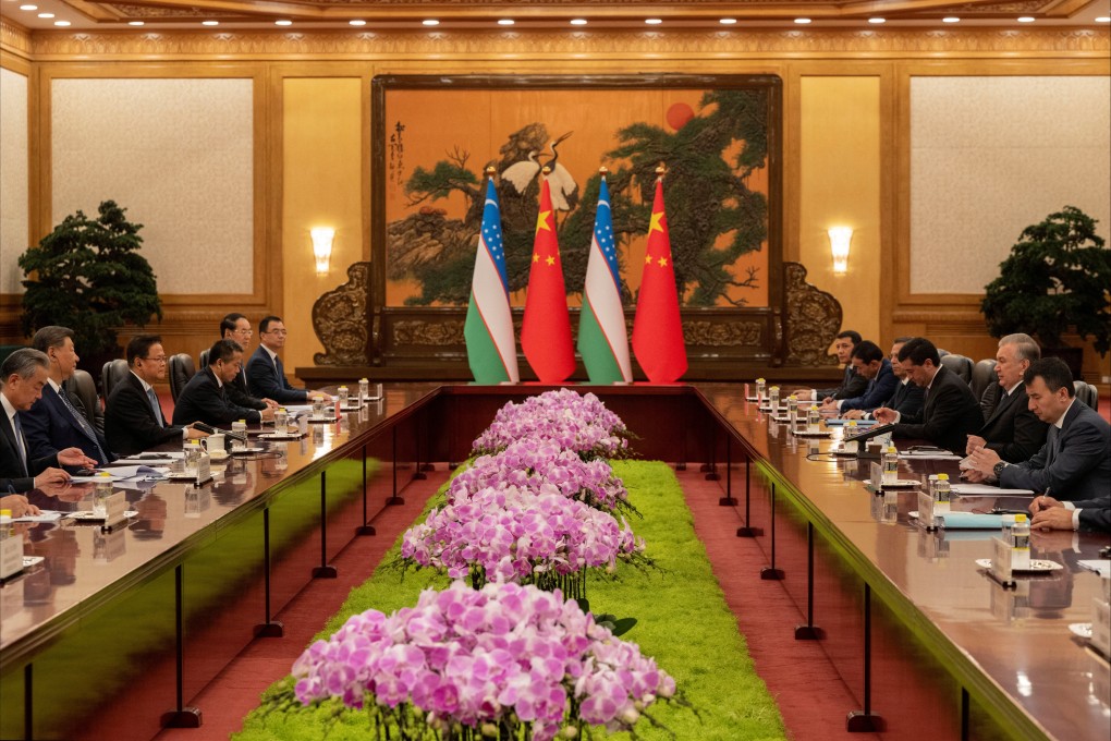 Chinese President Xi Jinping meets Uzbek President Shavkat Mirziyoyev and his delegation at the Great Hall of the People on September 2 in Beijing. Photo: Pool via Reuters