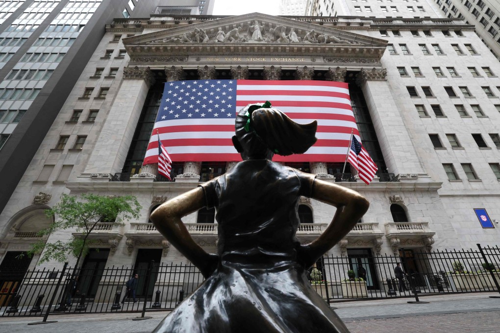 The “Fearless Girl” sculpture outside the New York Stock Exchange. Photo: AFP