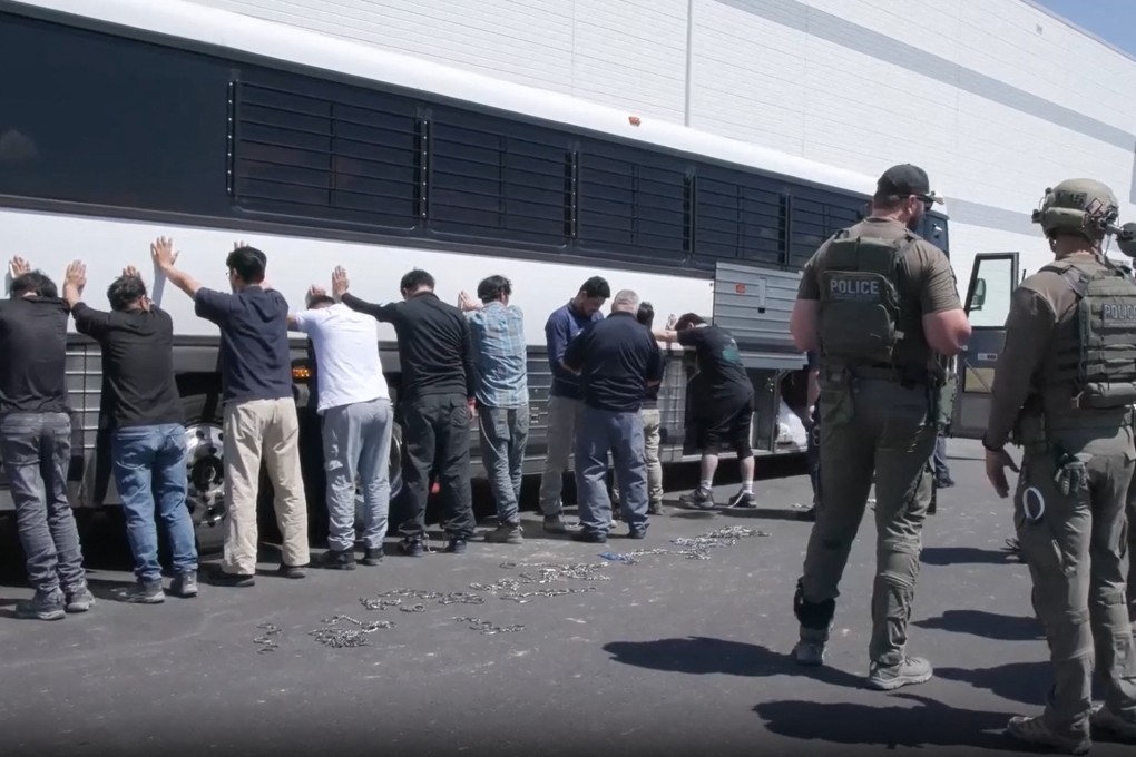 A screenshot from a video shows US Immigration and Customs Enforcement agents executing an operation at a Hyundai-LG factory in Ellabell, Georgia, on September 4. Photo: US Immigration and Customs Enforcement / AFP